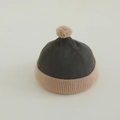 Detailed macro view of soft ribbed texture on baby knit beanie with pom-pom - 50-52cm (2-4 Years) / Army Green & Khaki