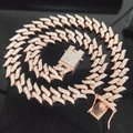Macro shot of rose gold iced out Cuban link chain with sparkling pavé rhinestones - 40 cm / Rose Gold
