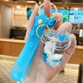 Portachiavi a cuore blu con sabbie mobili liquide, fascino coniglio e campanello - Orso Polare Blu sott'Olio - Coppa Cuore