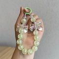 Green beaded keychain with cracked texture beads and iridescent bow accessory - Green Bow Combo