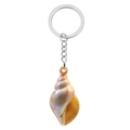 Macro detail of conch shell keychain pendant with realistic texture and pearlescent finish - Yellow
