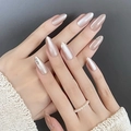Macro detail of long stiletto press-on nails with pearl pink finish and rhinestones - By1730鸾飘凤泊 / Phototherapy Glue Style