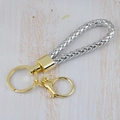 Silver woven cord keychain with gold hardware and lobster clasp on wood background - Generation 1 Round Dragon Woven Buckle (Light Gold) / Silver