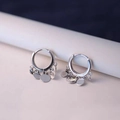 Silver drop hoop earrings with multiple polished round discs dangling on pink surface - Silver Disc Charm Hoop