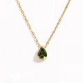 Close-up of pear-cut green zircon pendant with four-prong setting on golden chain - Olive Green Teardrop
