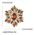 Broche vintage dorée avec gemme marron et strass ambrés, dimensions 9,5 cm x 8,7 cm - café