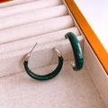 Macro detail of dark green crocodile pattern leather-wrapped C-shaped hoop earrings - Leather Wrapped C-Shape (925 Silver Pin) / Dark Green