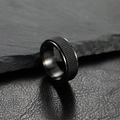 Mens 8mm black stainless steel ring with mesh inlay on rock and leather background - US 10 / Black