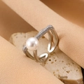 Double-layered silver ring featuring a lustrous white pearl and sparkling zircon accents - Silver Pearl Cross Diamond Ring (0505)