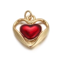 Close-up of heart-shaped pendant with red center and polished gold-plated metal frame - Red Gem Texture Heart Pendant
