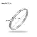Sleek silver heart-shaped stainless steel bangle with a minimalist oval metal design - Silver Hollow Heart Style (BR-198)