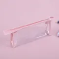 Minimalist clear PVC stationery pouch with pink fabric trim and zipper closure - Pink