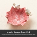 Pink ceramic leaf jewelry tray with two small white birds and gold beak accents - Jewelry Storage Tray - Pink