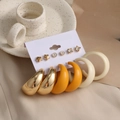 Detail of 6-piece earring set featuring gold studs and resin hoops on display card - Gold Star Daisy Resin Hoop Set (HZS2094-1)
