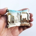 Italian travel souvenir magnet featuring Siena cathedral relief on hand-held scroll - Siena Scroll Landmark
