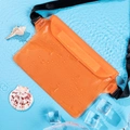Orange waterproof waist bag with adjustable strap shown with water droplets on blue background - Orange