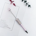 Elegant purple beaded pen with shimmering AB crystals and metallic pointed accents - Colorful Light Pink
