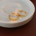 Golden twisted hollow geometric hoop earrings with signature letter engraving - Letter Engraved Hoop (Gold)