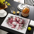Pink ribbon and floral wreath Christmas placemat on a dark wooden dining table - CD57-6