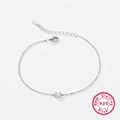 Elegant S925 sterling silver bracelet with a sparkling crystal horseshoe charm - Letter U / White Gold