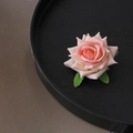 Pink rose flower hair clip with green leaves on a black tray for elegant hair styling - Small Rose / Korean Pink