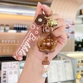 Brown liquid quicksand ball keychain with glitter, mushroom charm and Bubble strap - Oil-filled Flower - Brown