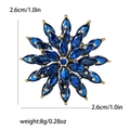Rotating golden snowflake brooch with deep blue marquise stones and small gold beads - Blue