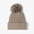 Women's khaki knit beanie with pompom and ribbed texture for winter warmth - One Size / Khaki