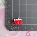 Detailed macro view of 1.2cm resin food charms for DIY hair accessories and jewelry making - 10*Mini Cream Sugar Gourd