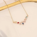 Collana in acciaio inossidabile dorato con fiore di zirconi colorati su un piatto bianco - 2# Forma a V Farfalla