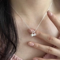 Silver thin chain necklace featuring a white pearl and clear zircon pendant on a model - Pearl Rhinestone Double Pendant Style (XL2511)