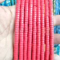 Close-up of bright red disc spacer beads for DIY necklace and bracelet jewelry making - Red Howlite