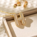 Gold balloon letter H pendant necklace with clear zircons in a premium gift box - Letter H (18k Gold + Bead Chain)