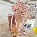 Rosa Acryl Ohrring-Organizer im Kleiderbügel-Design mit Mini-Bügeln auf weichem Teppich - Mit 8 Kleiderbügeln / Roségold