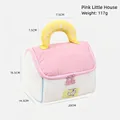 Pink house-shaped storage bag with white stripes and yellow arched handle detail - Pink