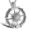 Macro shot of silver sunburst pendant with Gothic engraved letters and box chain - Silver + Stainless Steel Chain