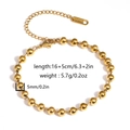 Macro shot of 5mm gold stainless steel beaded bracelet with adjustable chain details - 5mm Round Bead Chain Style