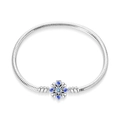Macro shot of silver snake chain bracelet with blue snowflake charm and crystal inlay - PAB018-Blue Lucky Clover