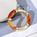 Minimalist amber tortoise resin and gold metal curved tube bracelet for women - Brown Gold