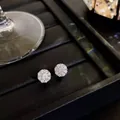 Elegant rotating sunflower stud earrings with sparkling crystals in silver finish - Silver Rotating Stud Earrings