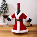 Detail of plush Santa suit wine bottle cover with black belt and fuzzy white trim - Santa Coat Style