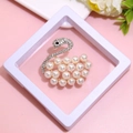 Elegant golden swan brooch with white pearls and sparkling crystals in a display box - XZ115-Swan Pearl-Boxed