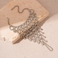 Close-up of silver mesh bracelet with water drop rhinestones and elegant fringe tassels - Hand Harness (HB1890) / Silver Tassel Style