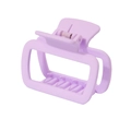 Macro detail of lavender rectangular hair claw clip with matte finish and metal spring - Purple