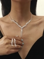 Silver necklace and earring set with shimmering crystals worn on a model for gala - Y-Shape Drop Shiny Gem Set (DTN14026229S)