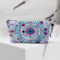 Detail of waterproof evil eye cosmetic bag with zipper closure and geometric patterns - Color Geo Art