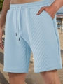 Detail of light blue waffle fabric texture on men's casual shorts with drawstring waist - Light Blue