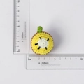 Handmade crochet kiwi slice keychain charm with realistic yellow fruit pulp details - Yellow Kiwi Fruit Slice