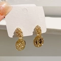 Vintage style gold coin earrings with portrait embossing and a polished metallic finish - Vintage Coin Portrait