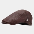 Detail view of dark brown PU leather beret featuring a lychee texture and bronze buckle - Adjustable / Coffee